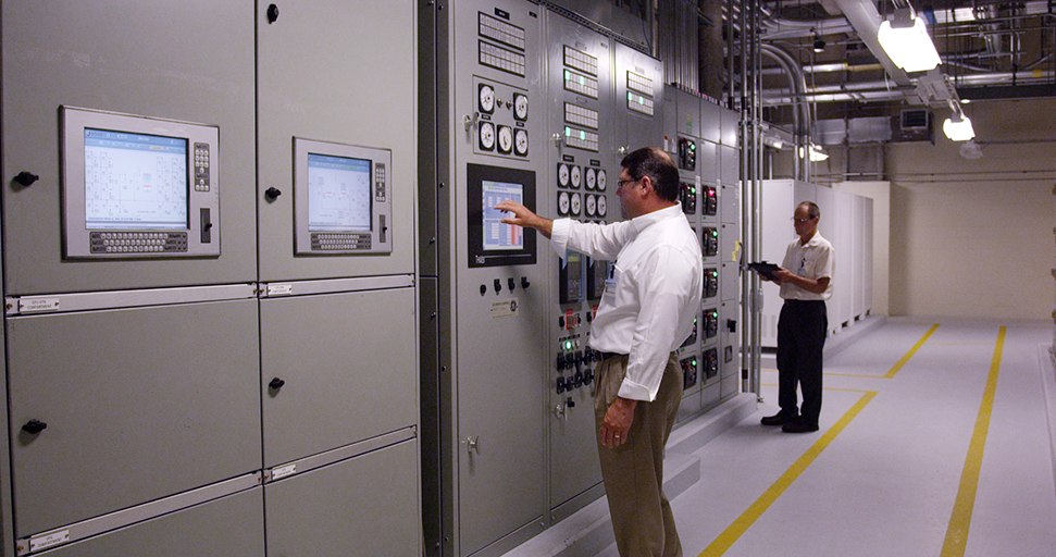 Person monitoring electrical pannels.